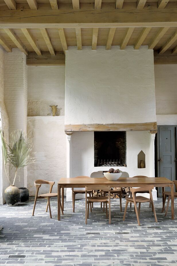 Materials don’t get much more durable or beautiful than moisture-resistant, decay-resistant teak. Find the dining table here and the chairs here.
